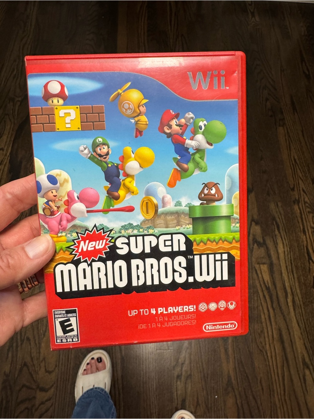 Nintendo New Super Mario Bros. Wii game with Red Case with Colorful Art